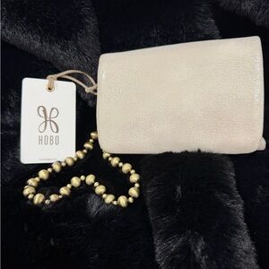 HOBO Cream Clutch with Gold Accents
